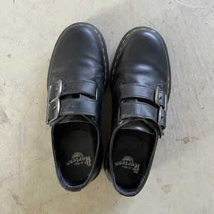 Dr Martens black shoes with metal straps